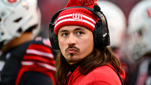 Nov 25, 2023; Salt Lake City, Utah, USA; Utah Utes quarterback Cameron Rising (7) on the sidelines against the Colorado Buffaloes at Rice-Eccles Stadium.